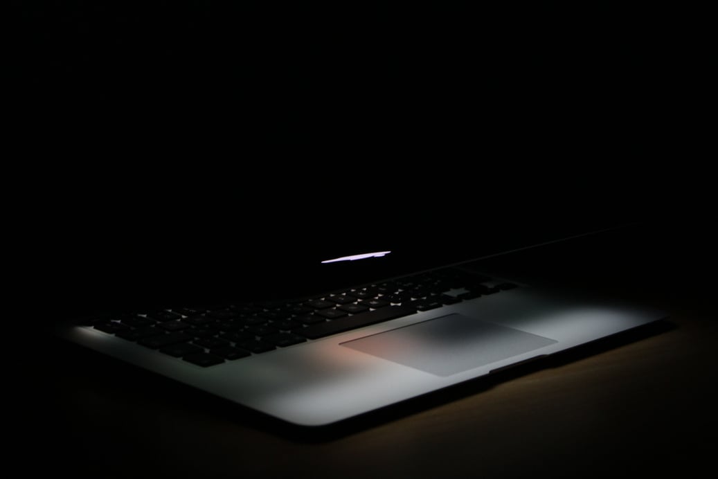 Photography of Laptop In a Dark Area